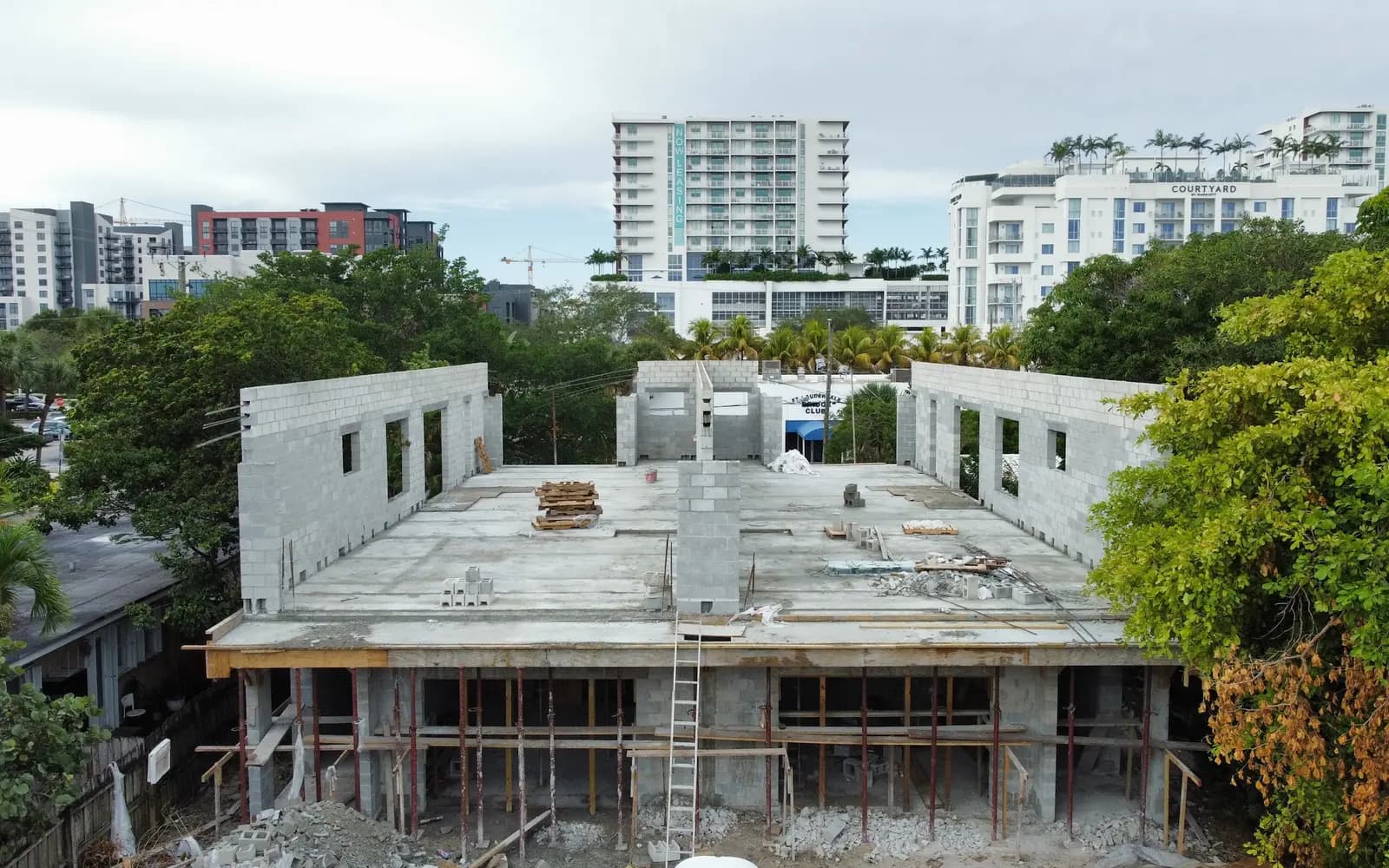 Concrete building shell in the city, aerial view