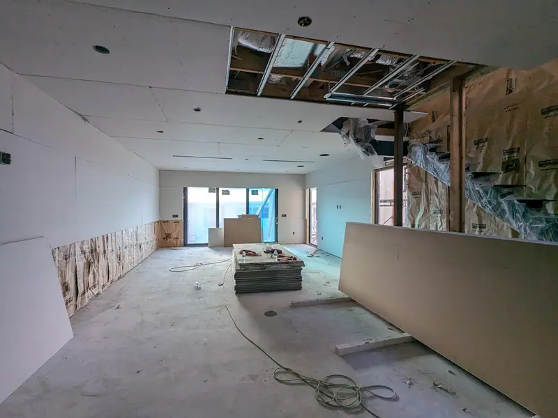 Drywall replaced in an open-plan room