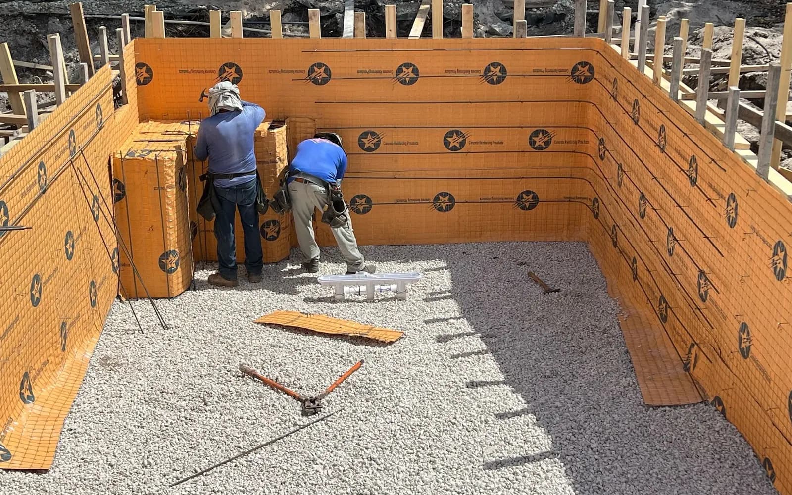 Concrete crew working on structural forms